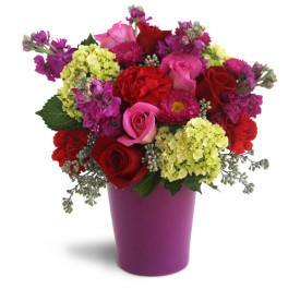 Exotic floral arrangement bursting with blooms for any occasion