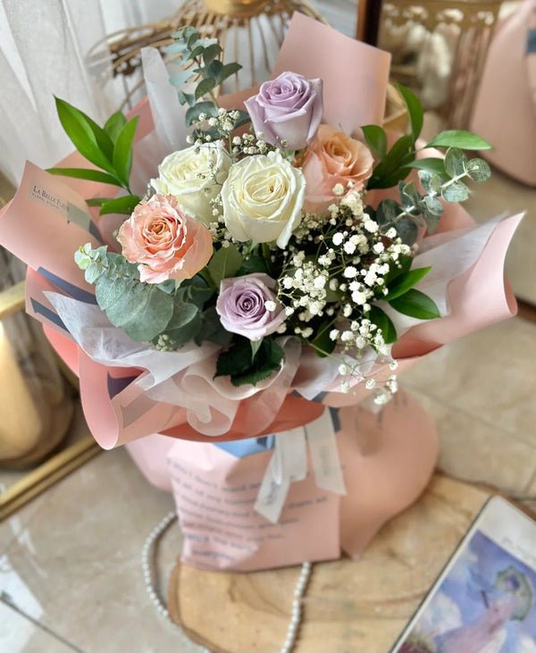 Melody Roses featuring white, peach, and lavender colors2