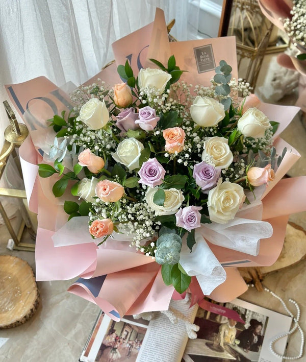 Melody Roses featuring white, peach, and lavender colors3