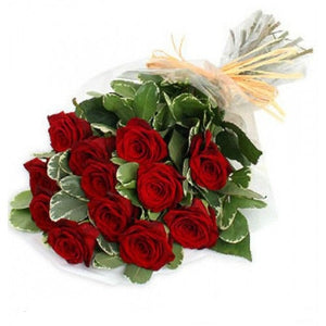Dozen wrapped red roses with 'I Love You' message, perfect blooms of paradise