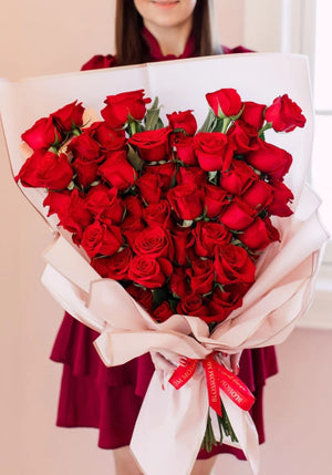 Elegant 50 red roses in a heart-shaped arrangement for Valentine's Day0